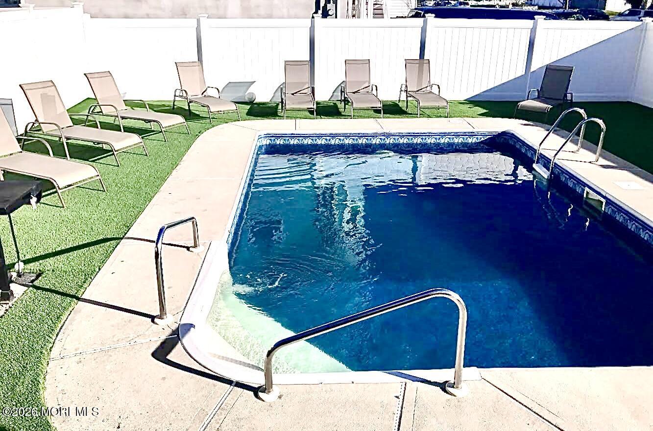 201 Arnold Avenue Point Pleasant Beach, NJ 08742 - Photo 32 of 33 a view of swimming pool outdoor seating