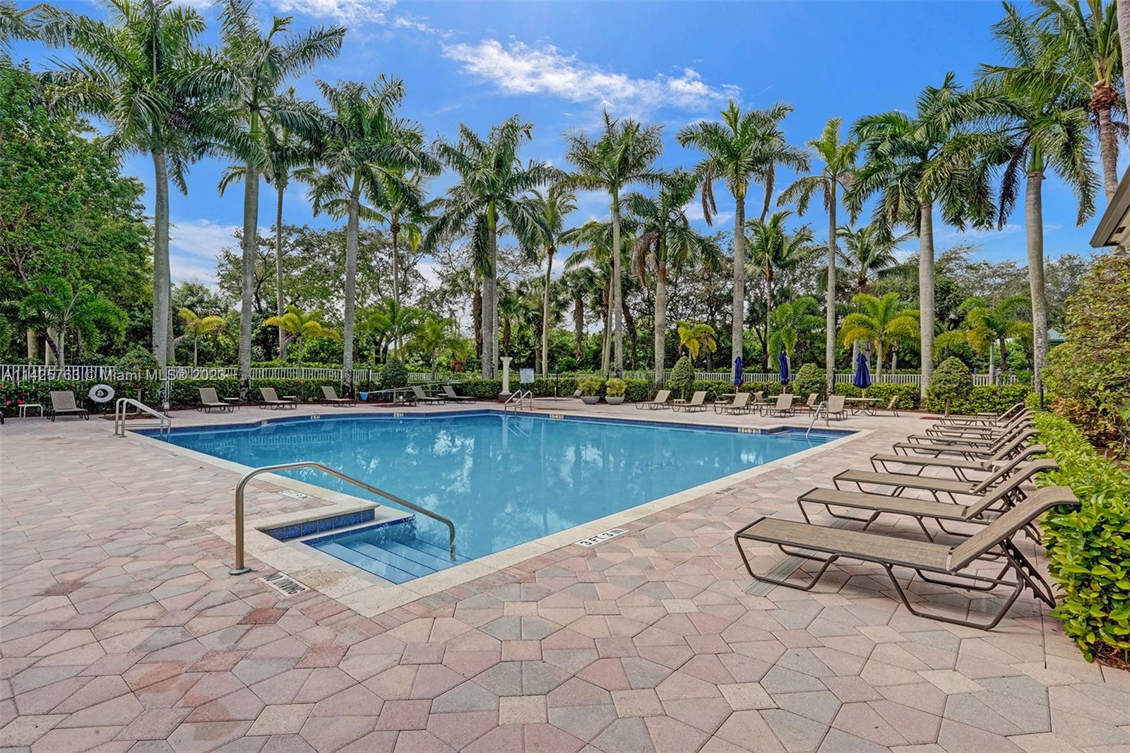 8375 Via Leonessa Boca Raton, FL 33433 - Photo 54 of 65 a view of swimming pool with chairs
