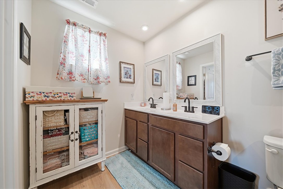 117 Alice Court Easley, SC 29642 - Photo 12 of 26 Double vanity with sleek fixtures offers ample counter space for daily routines.