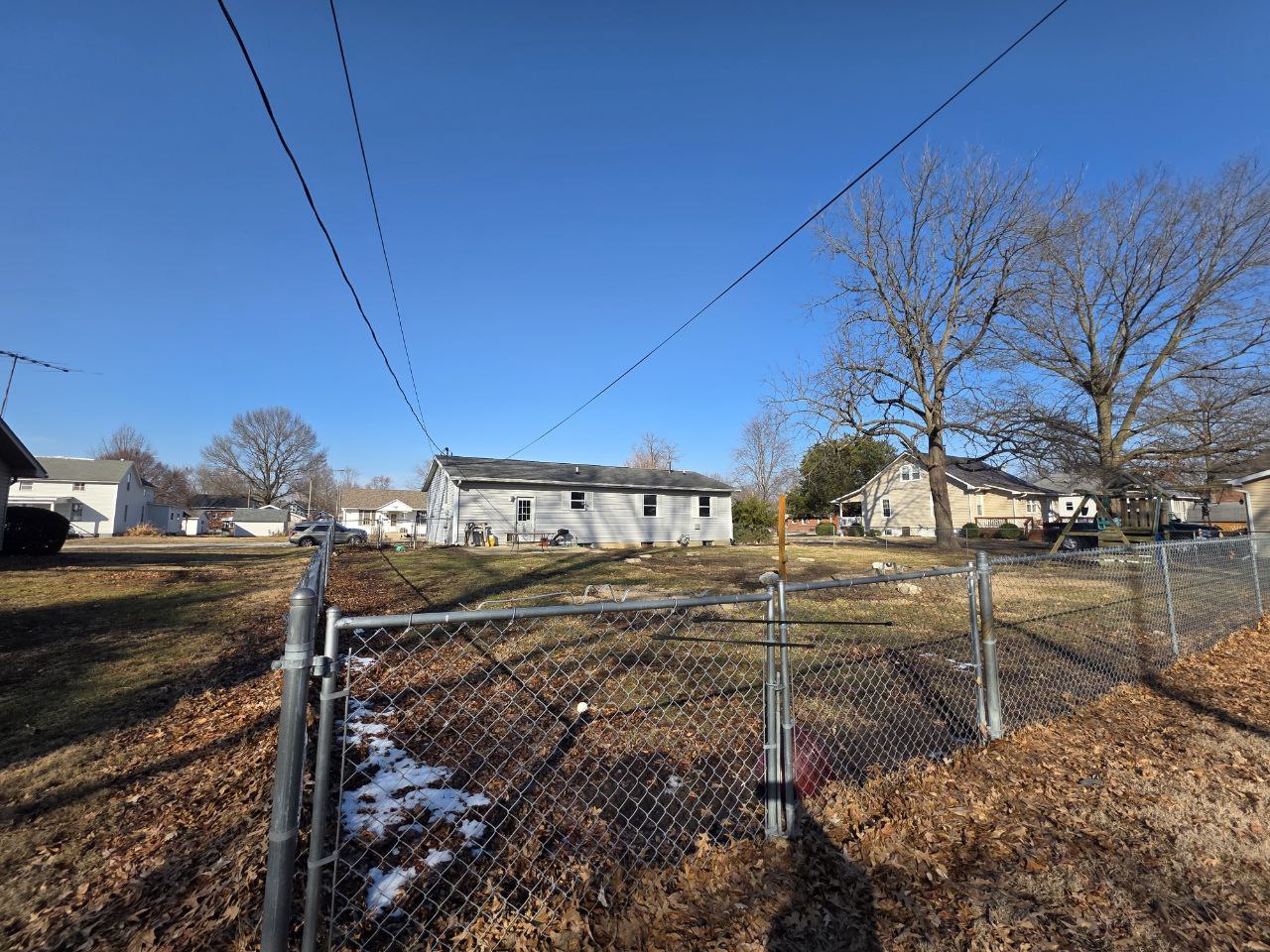 310 West 4th S Street Mount Olive, IL 62069 - Photo 2 of 10 a view of a house with a yard