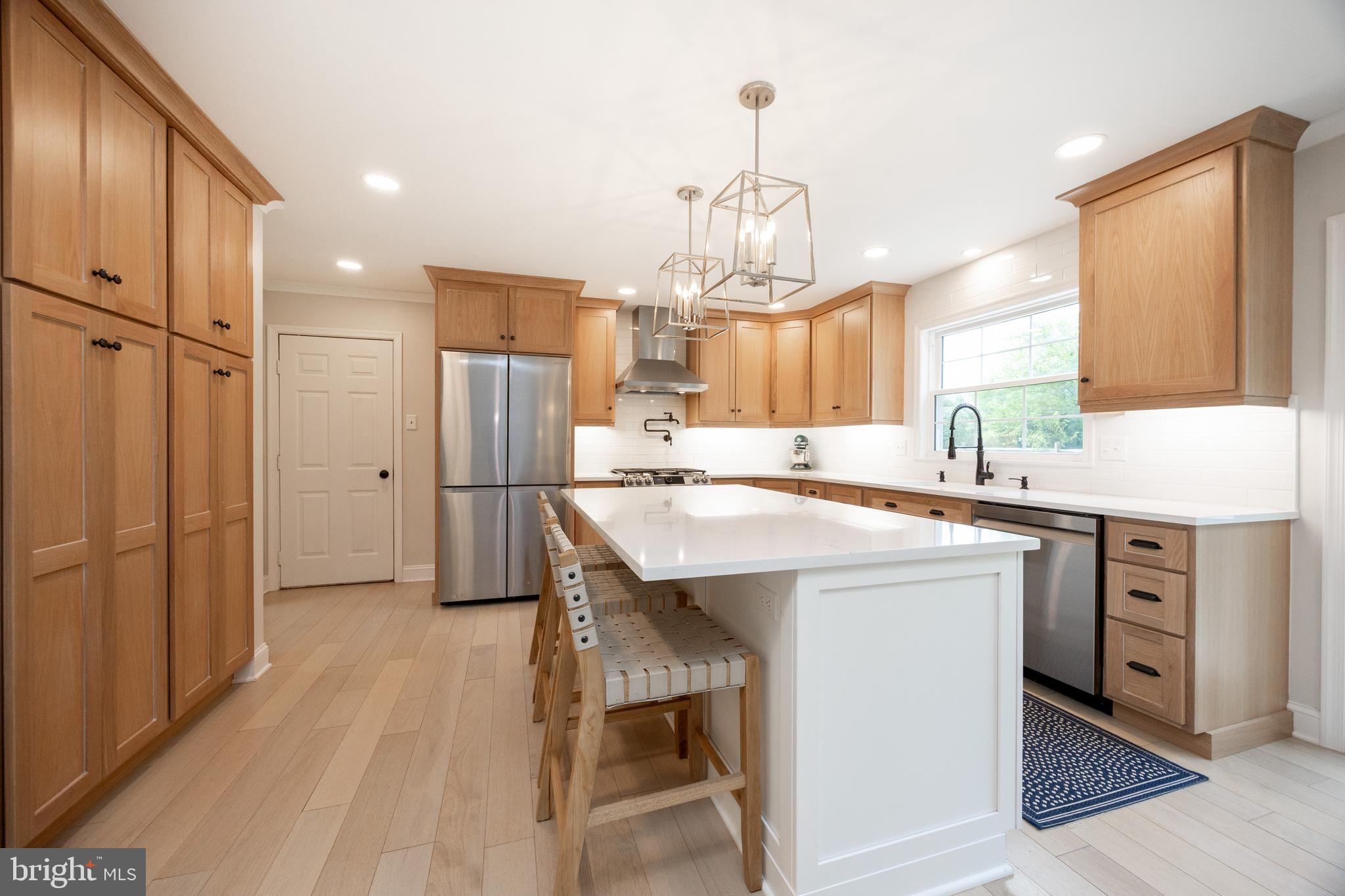 101 Ashley Road Phoenixville, PA 19460 - Photo 14 of 41 a kitchen with kitchen island a sink appliances and cabinets