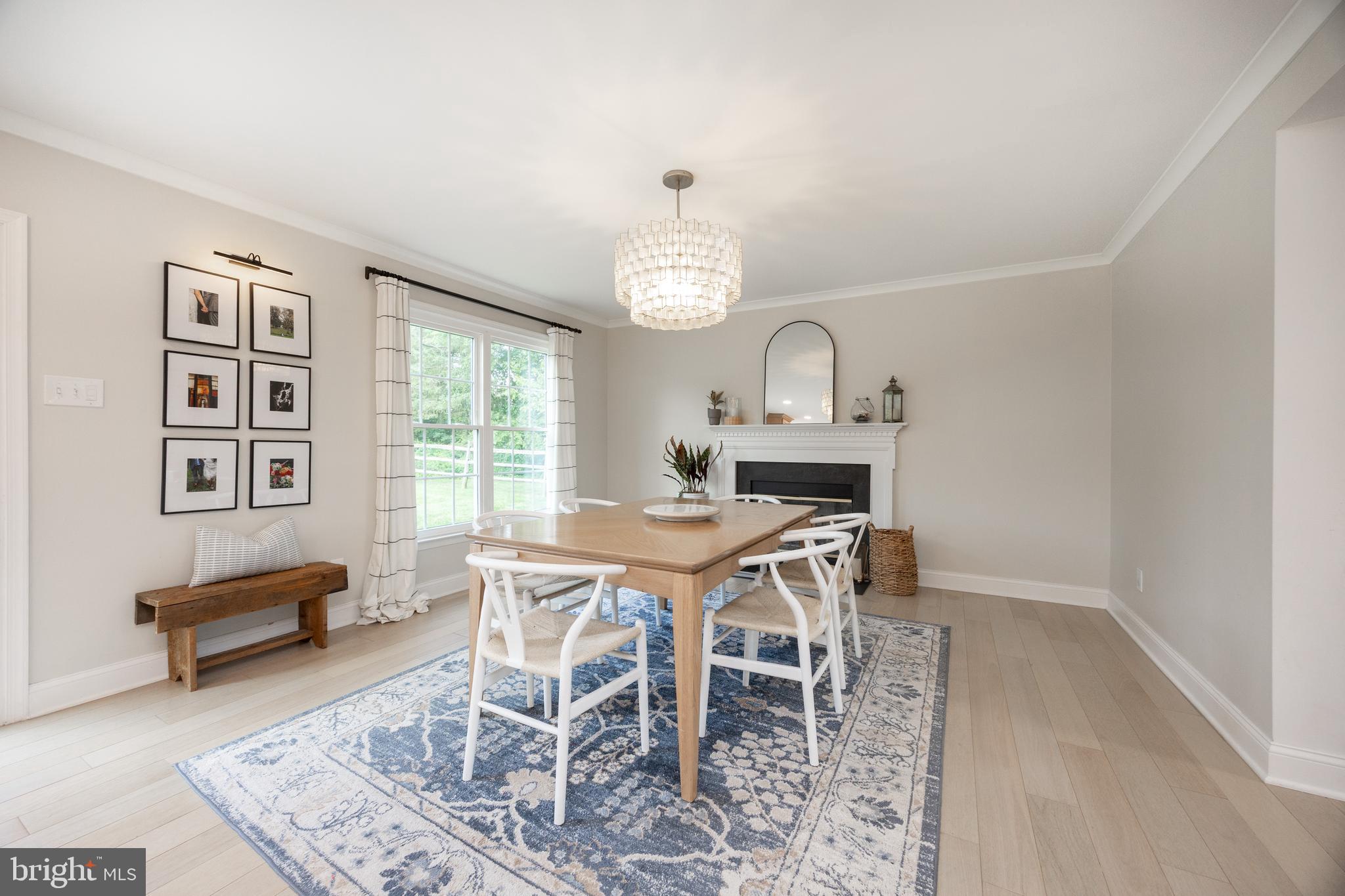 101 Ashley Road Phoenixville, PA 19460 - Photo 16 of 41 a view of a dining room with furniture window and wooden floor