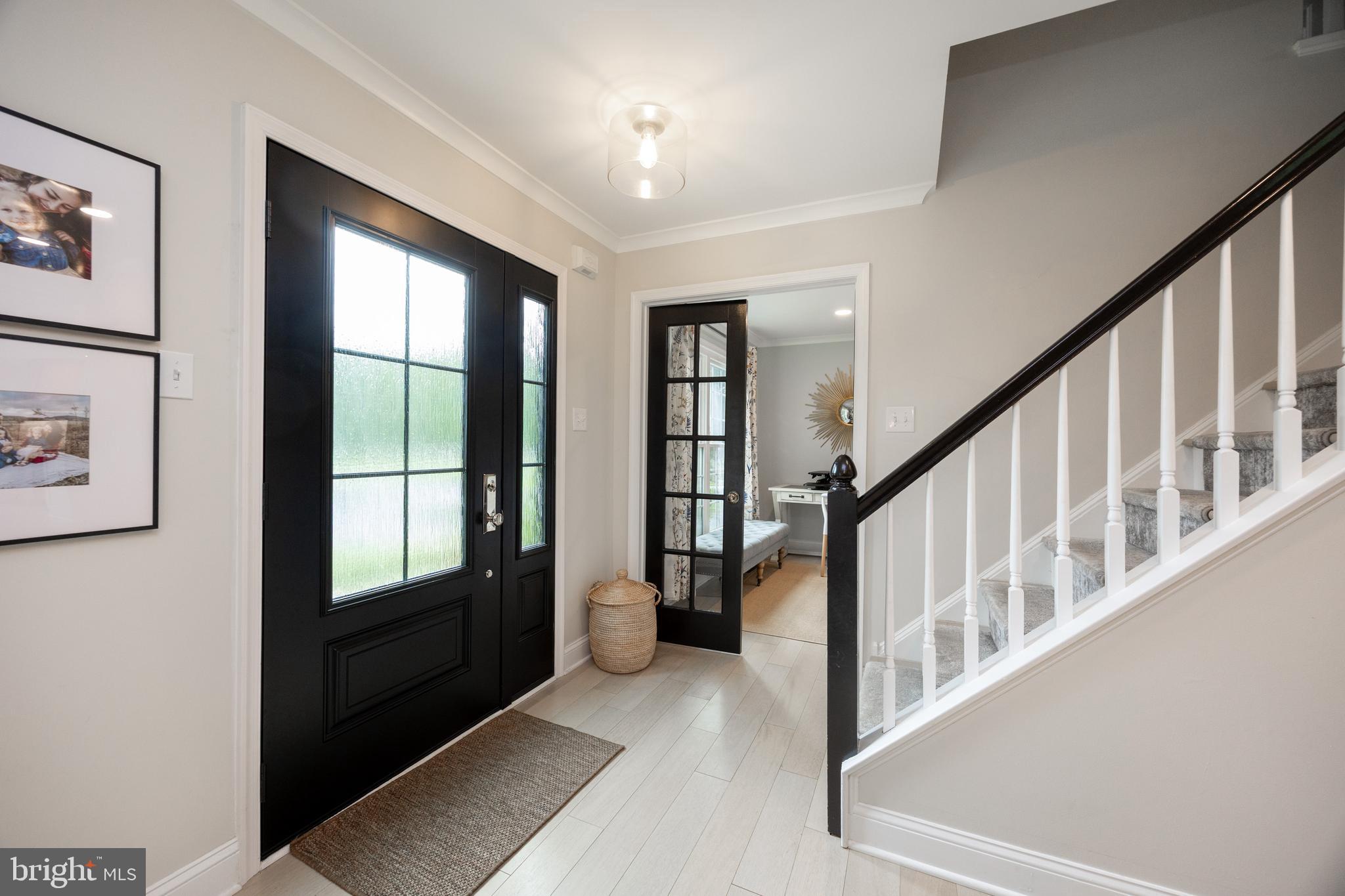 101 Ashley Road Phoenixville, PA 19460 - Photo 18 of 41 a view of an entryway with wooden floor and windows