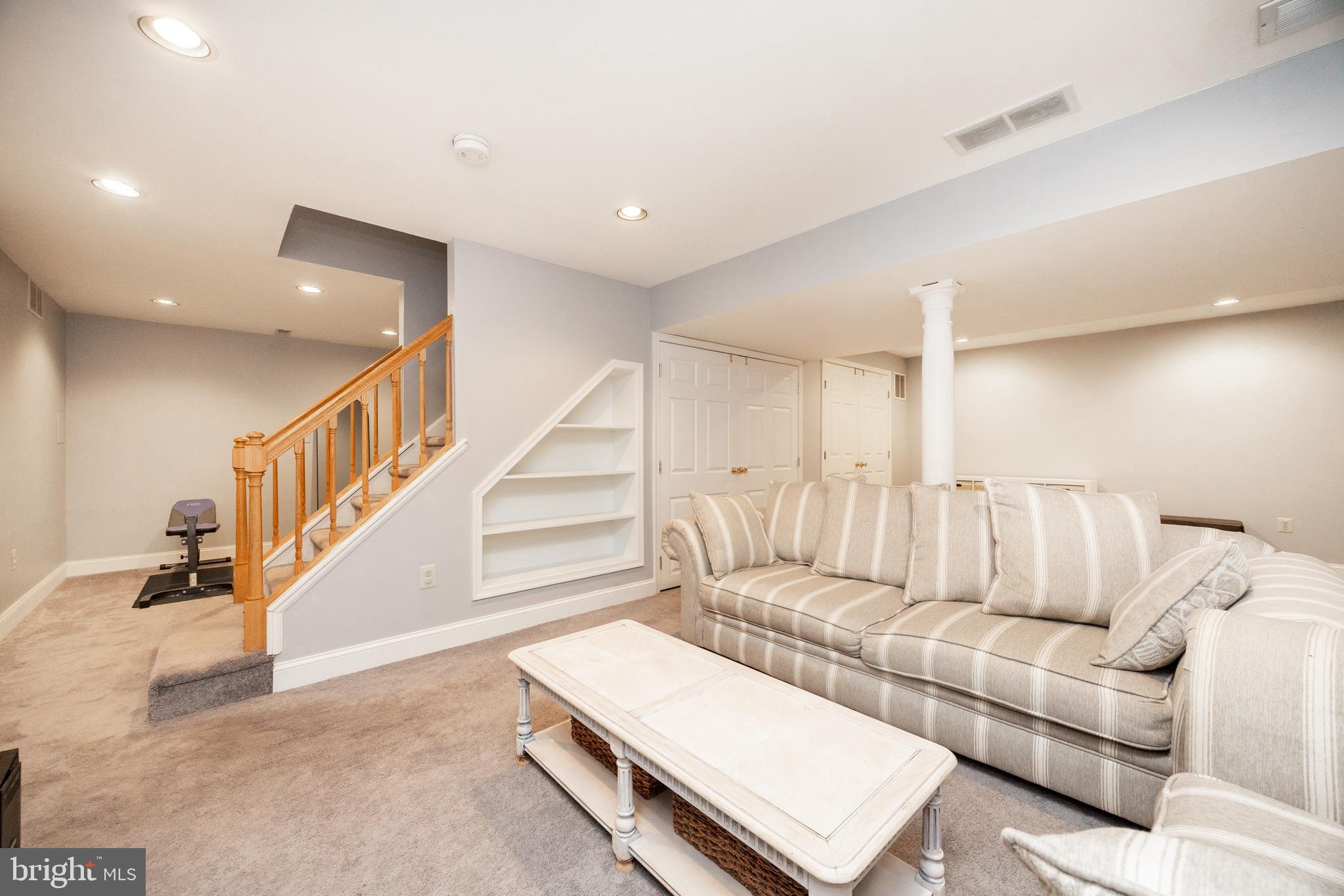 101 Ashley Road Phoenixville, PA 19460 - Photo 29 of 41 a living room with furniture and stairs