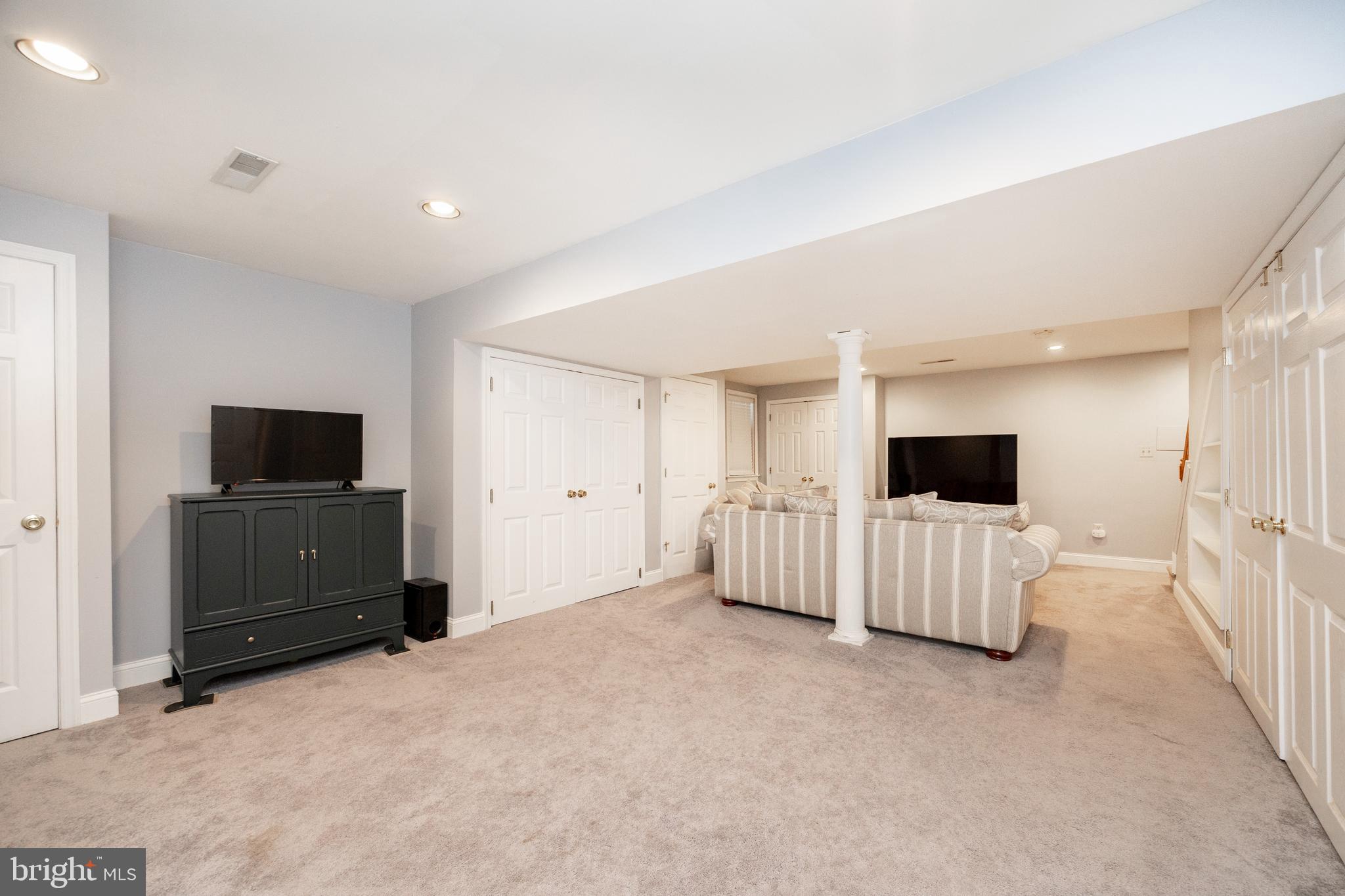 101 Ashley Road Phoenixville, PA 19460 - Photo 31 of 41 a living room with furniture and a flat screen tv