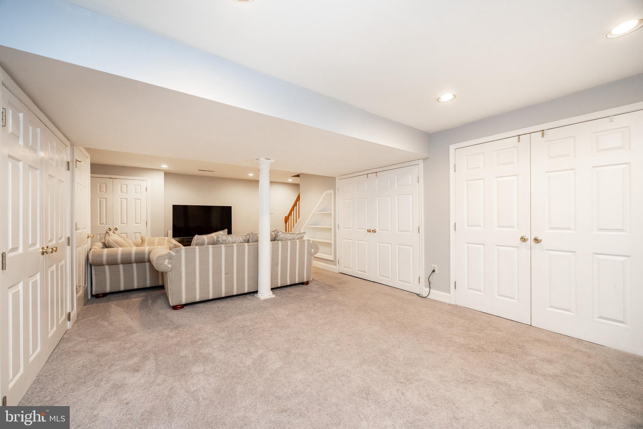 101 Ashley Road Phoenixville, PA 19460 - Photo 32 of 41 a living room with furniture and a flat screen tv