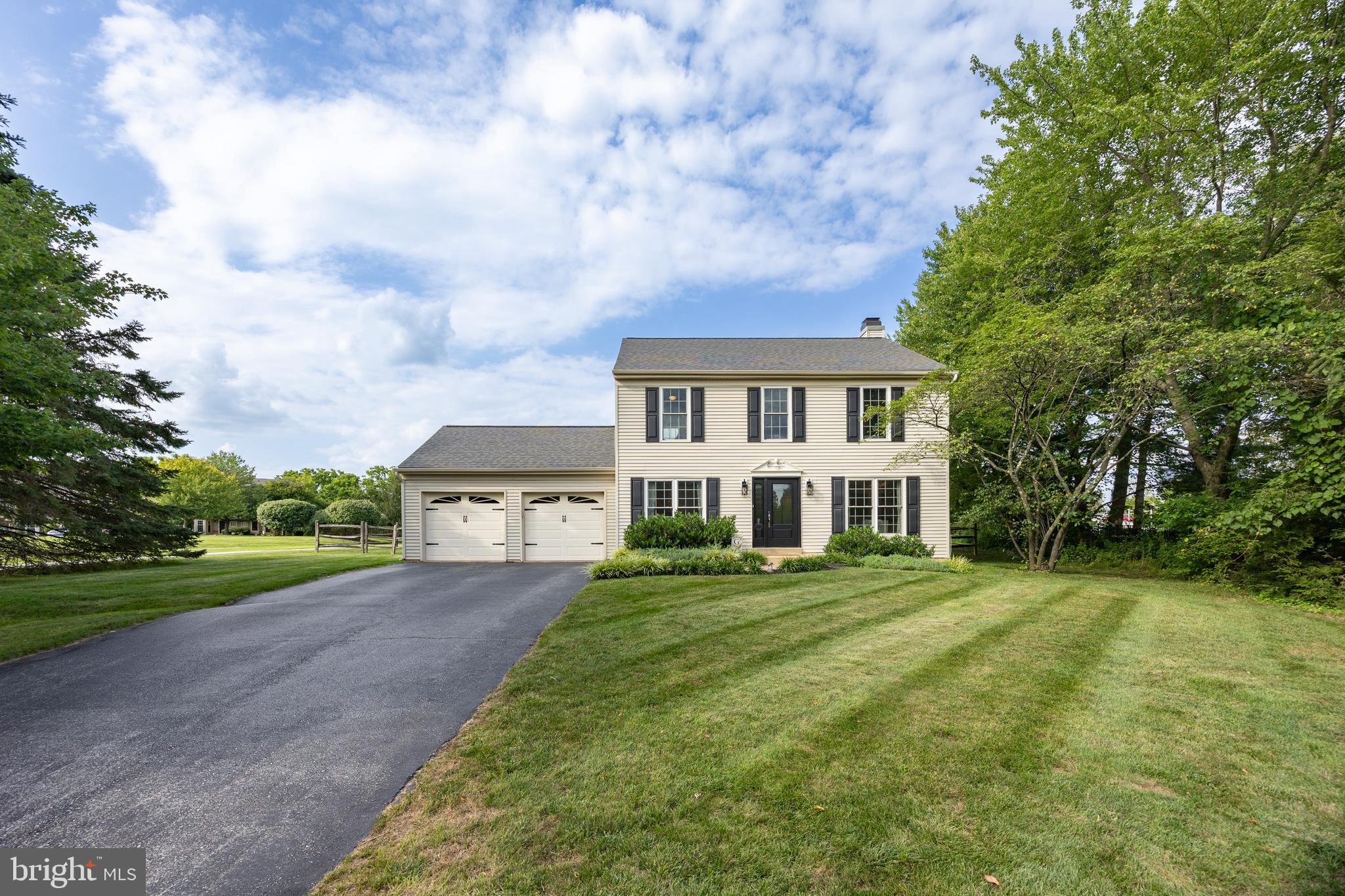 101 Ashley Road Phoenixville, PA 19460 - Photo 40 of 41 a view of a big house with a big yard and large trees