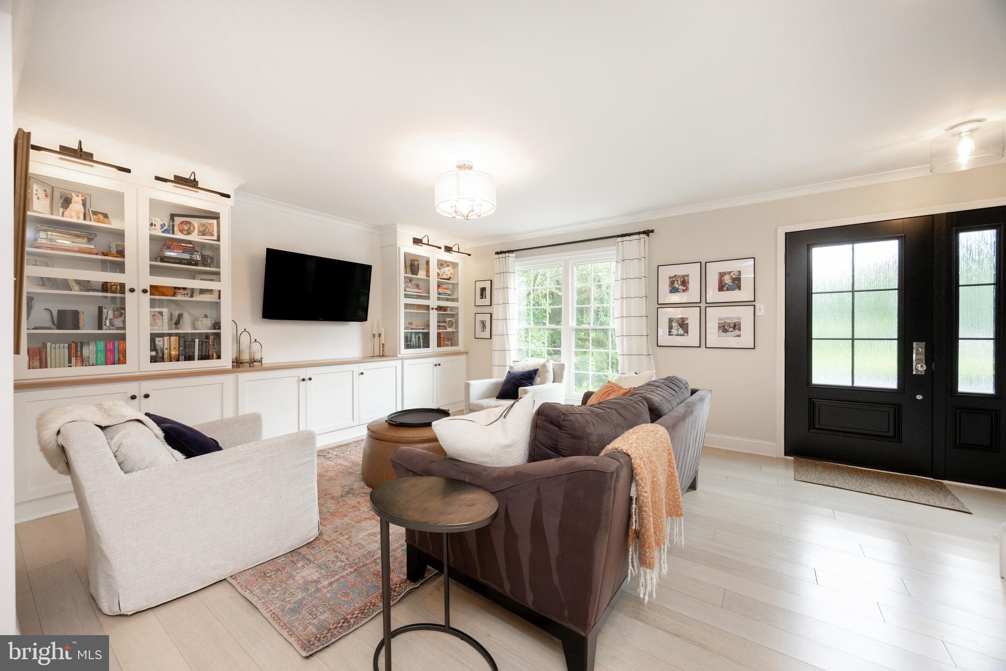 101 Ashley Road Phoenixville, PA 19460 - Photo 4 of 41 a living room with furniture and a flat screen tv