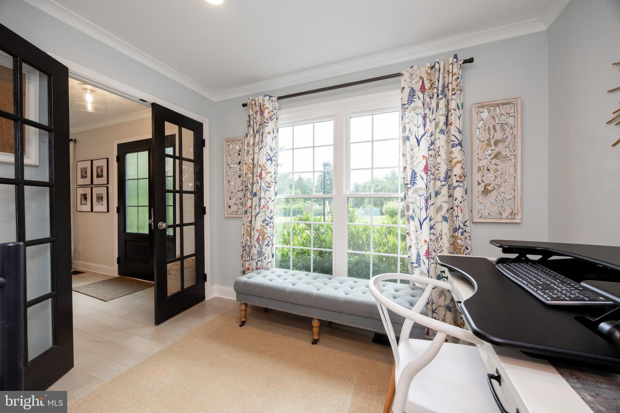 101 Ashley Road Phoenixville, PA 19460 - Photo 8 of 41 a living room with furniture and a window