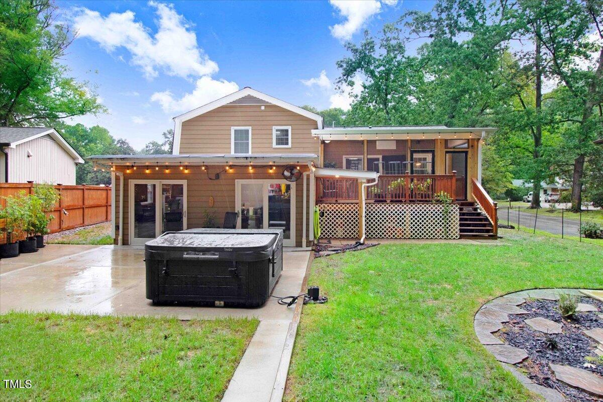 7509 Fiesta Way Raleigh, NC 27615 - Photo 2 of 56 a view of a house with backyard porch and sitting area