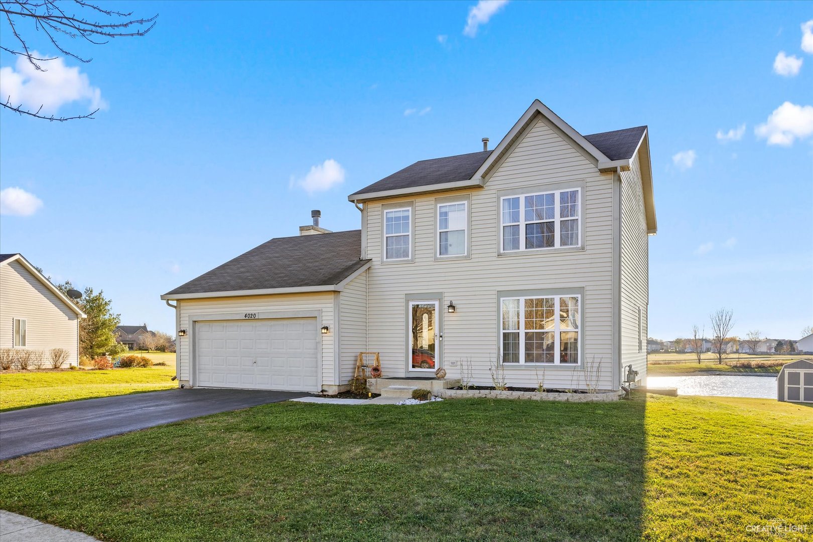 4020 Foli Street Plano, IL 60545 - Photo 1 of 17 a front view of a house with a yard