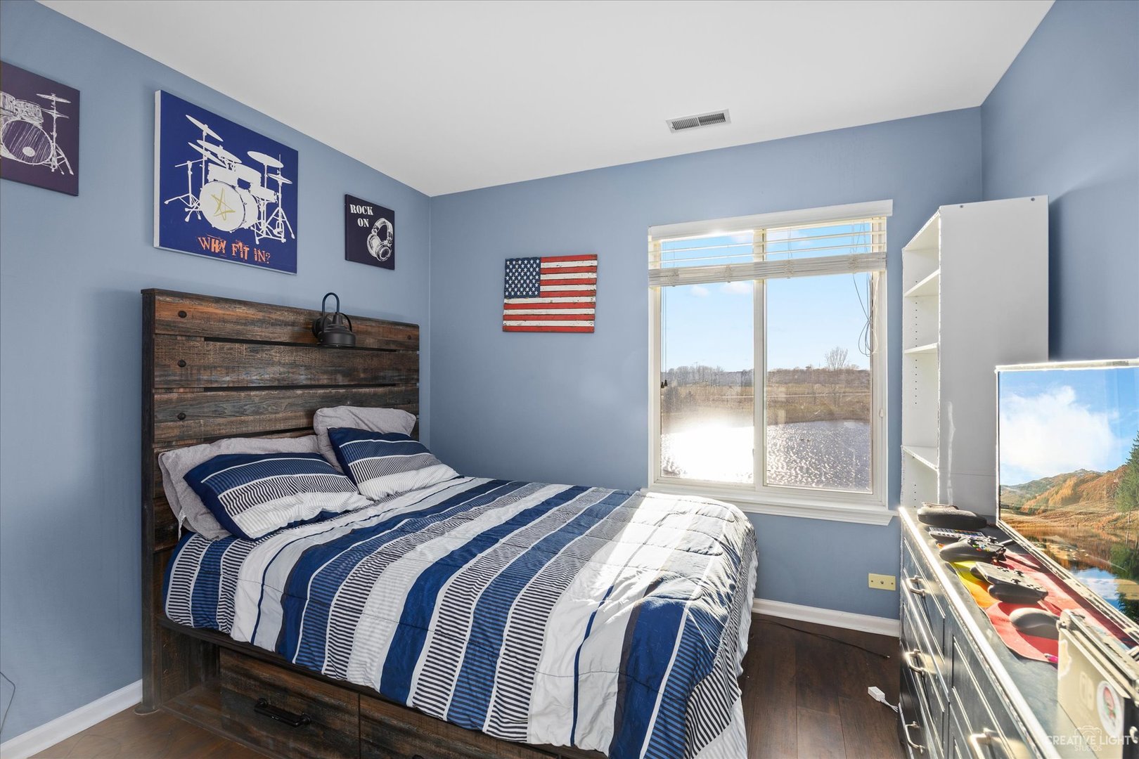 4020 Foli Street Plano, IL 60545 - Photo 13 of 17 a bedroom with a bed and a window