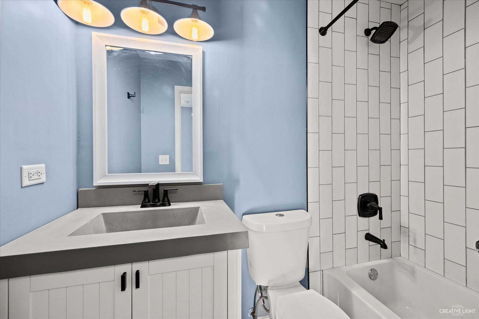 4020 Foli Street Plano, IL 60545 - Photo 14 of 17 a bathroom with a sink a toilet and shower