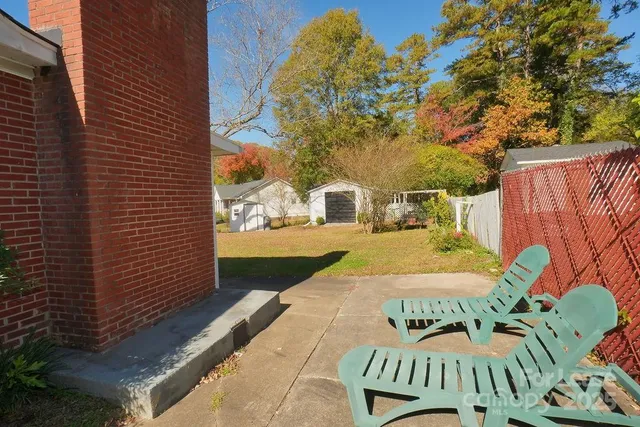 a view of balcony with furniture