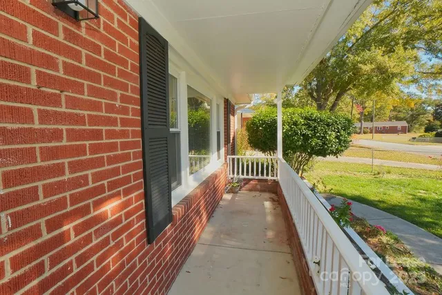 a view of swimming pool from a balcony