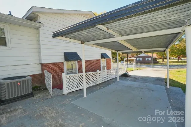 a view of a porch with furniture