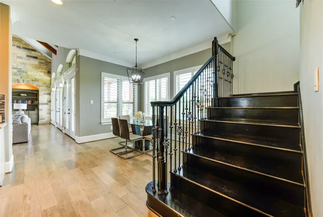 a kitchen with stainless steel appliances a sink and a refrigerator