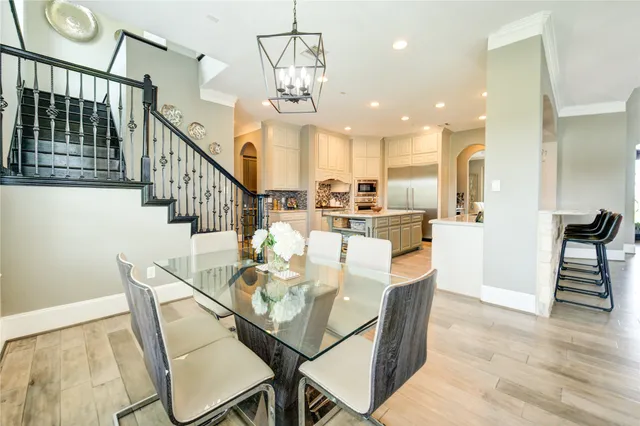 a kitchen with a sink and a refrigerator