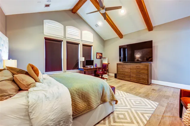 a spacious bathroom with a granite countertop tub shower and view