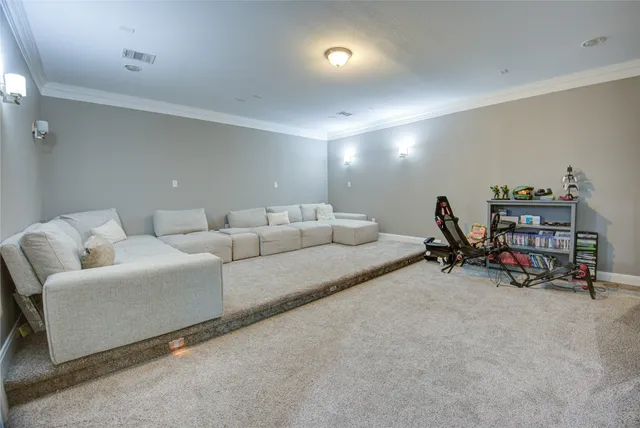a living room with furniture and a couch