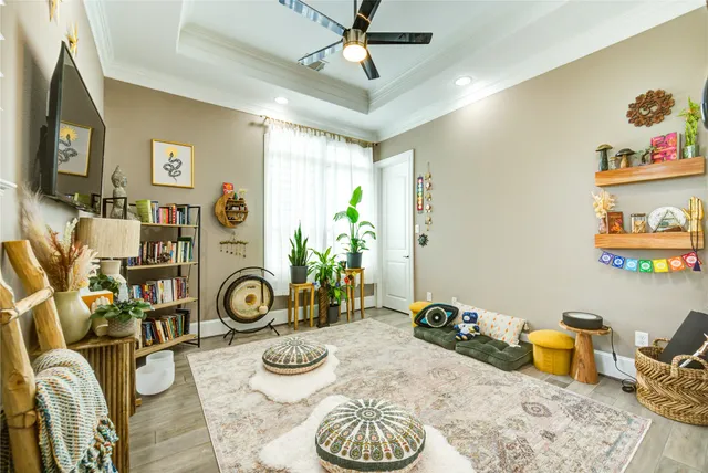 a kitchen with stainless steel appliances kitchen island granite countertop a stove a sink a refrigerator and a cabinets