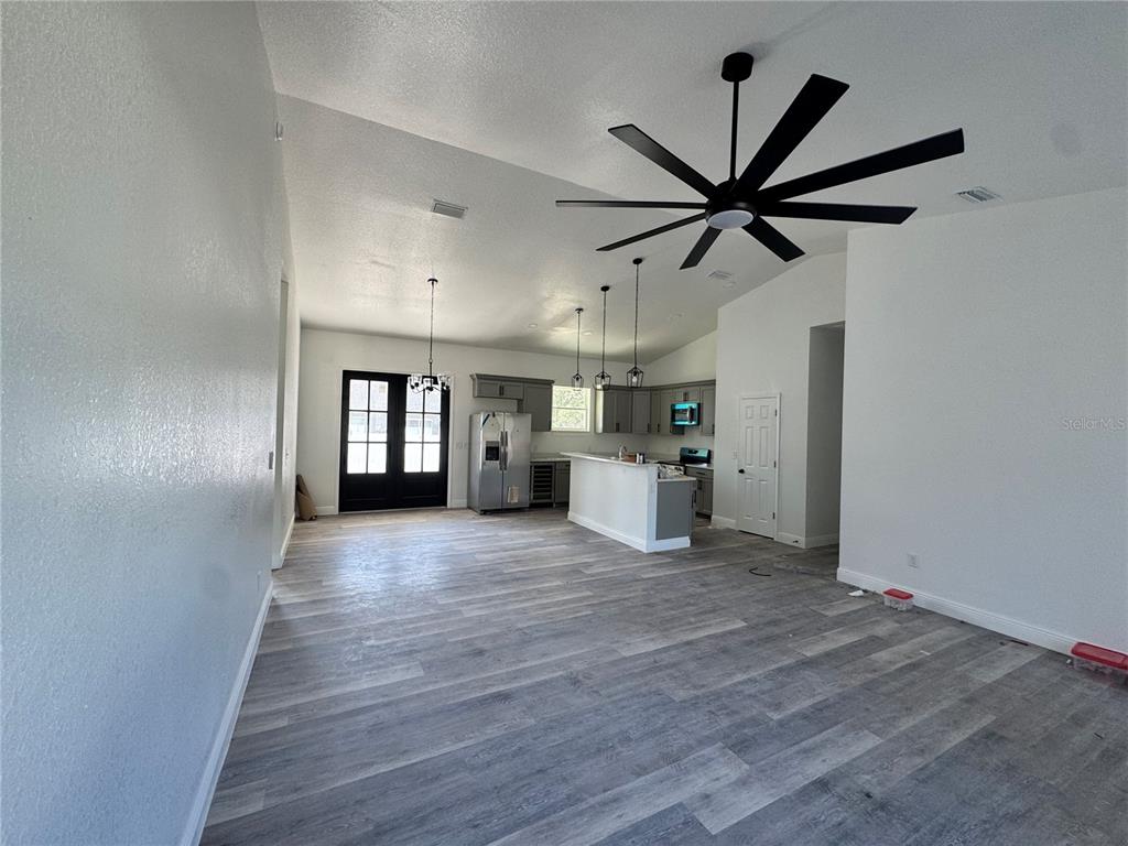 12757 Southeast 104th Terrace Belleview, FL 34420 - Photo 4 of 22 a view of a kitchen with a sink and a window