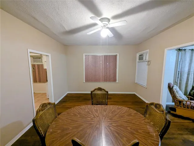 a bedroom with a bed and dresser