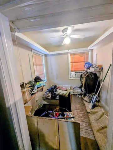 a room with furniture and gym equipment