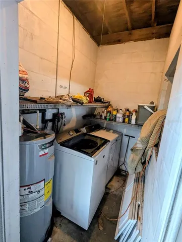 a stove top oven sitting inside of a kitchen
