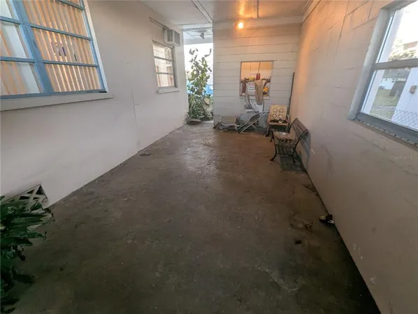 an empty room with windows
