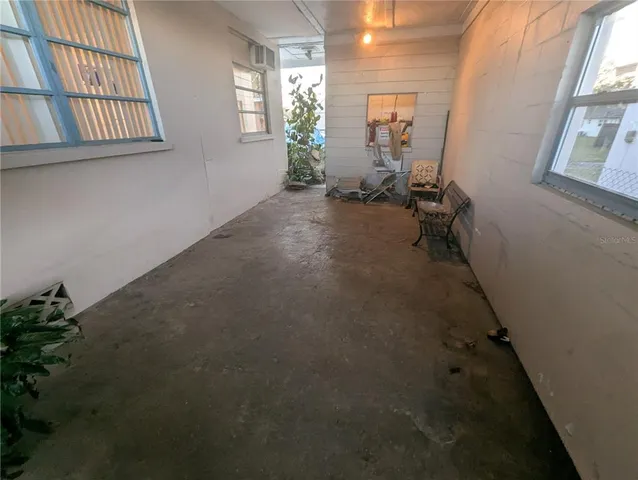 an empty room with windows