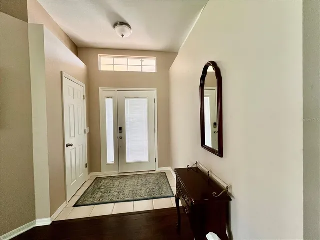 a view of a lake with a yard