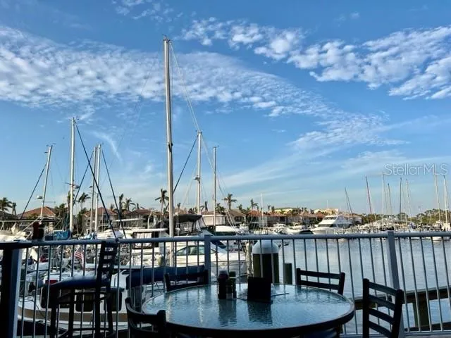 a view of a chairs and tables in patio
