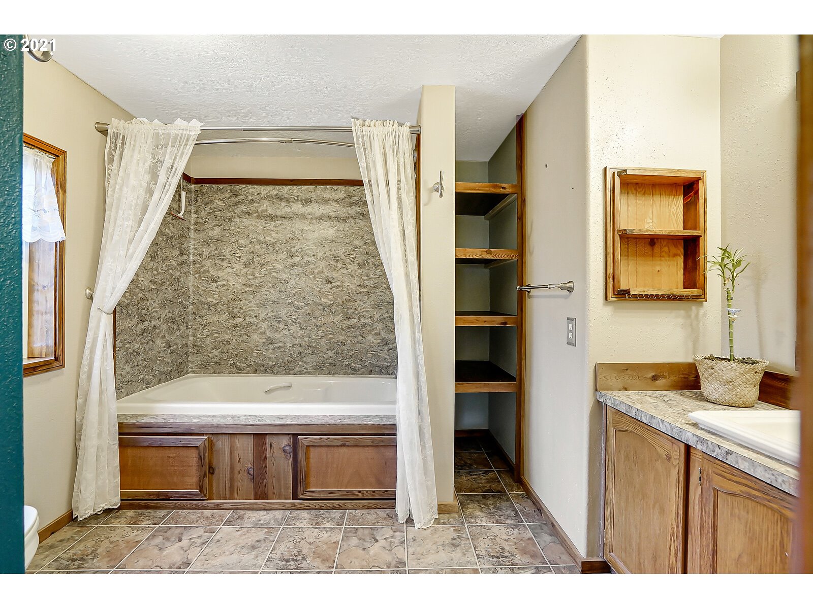 1725 Main Street Lyons, OR 97358 - Photo 15 of 32 a view of walk in closet with clothes and shoes