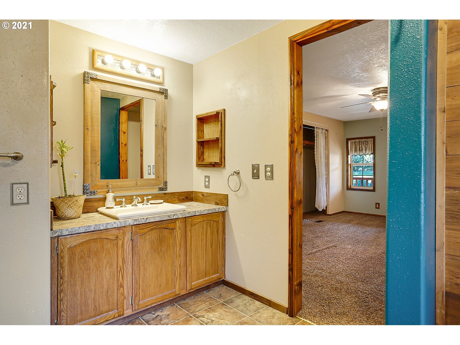 1725 Main Street Lyons, OR 97358 - Photo 20 of 32 a bathroom with a sink and a mirror