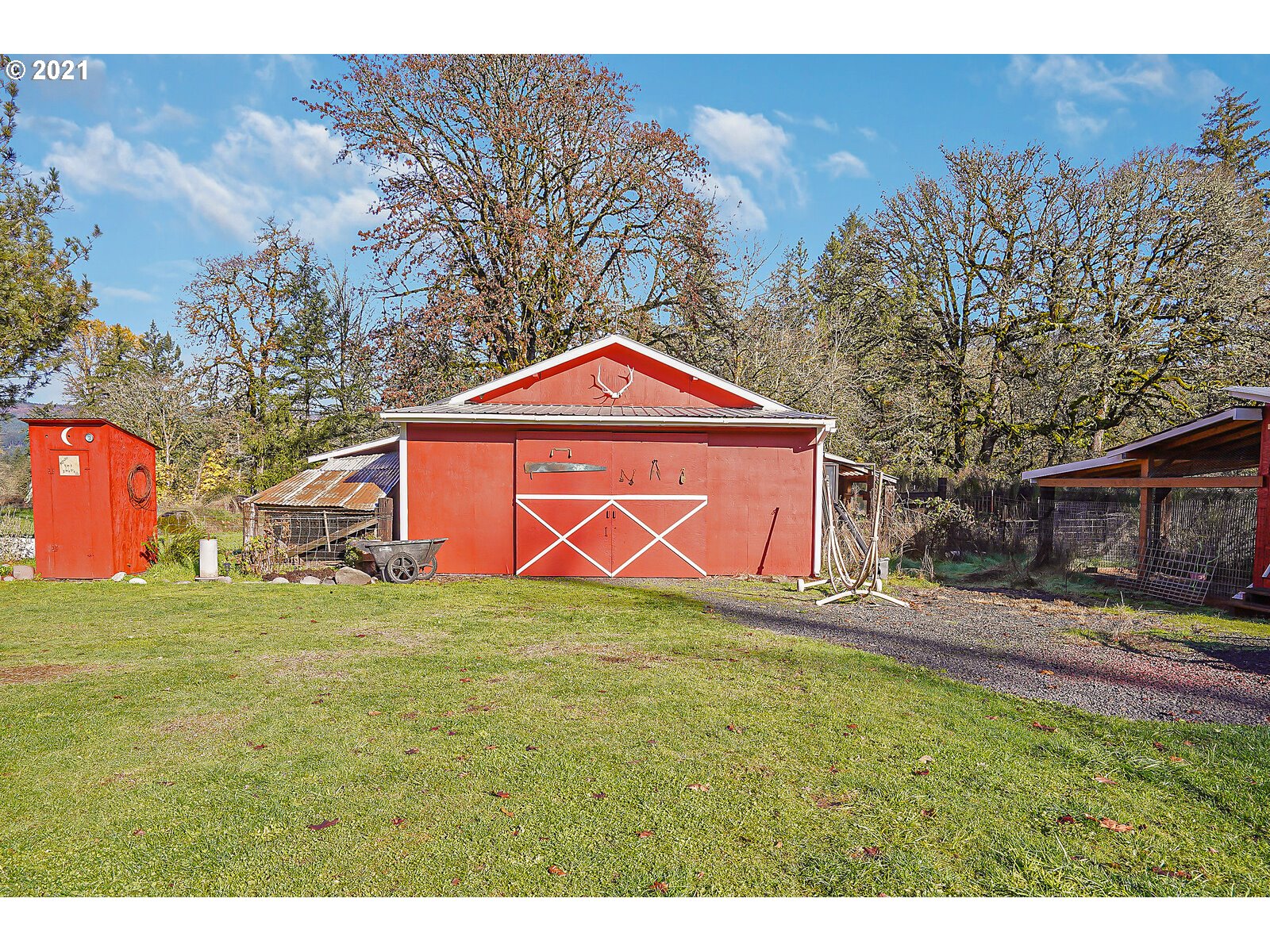 1725 Main Street Lyons, OR 97358 - Photo 3 of 32 a view of a yard in front of a house with a yard