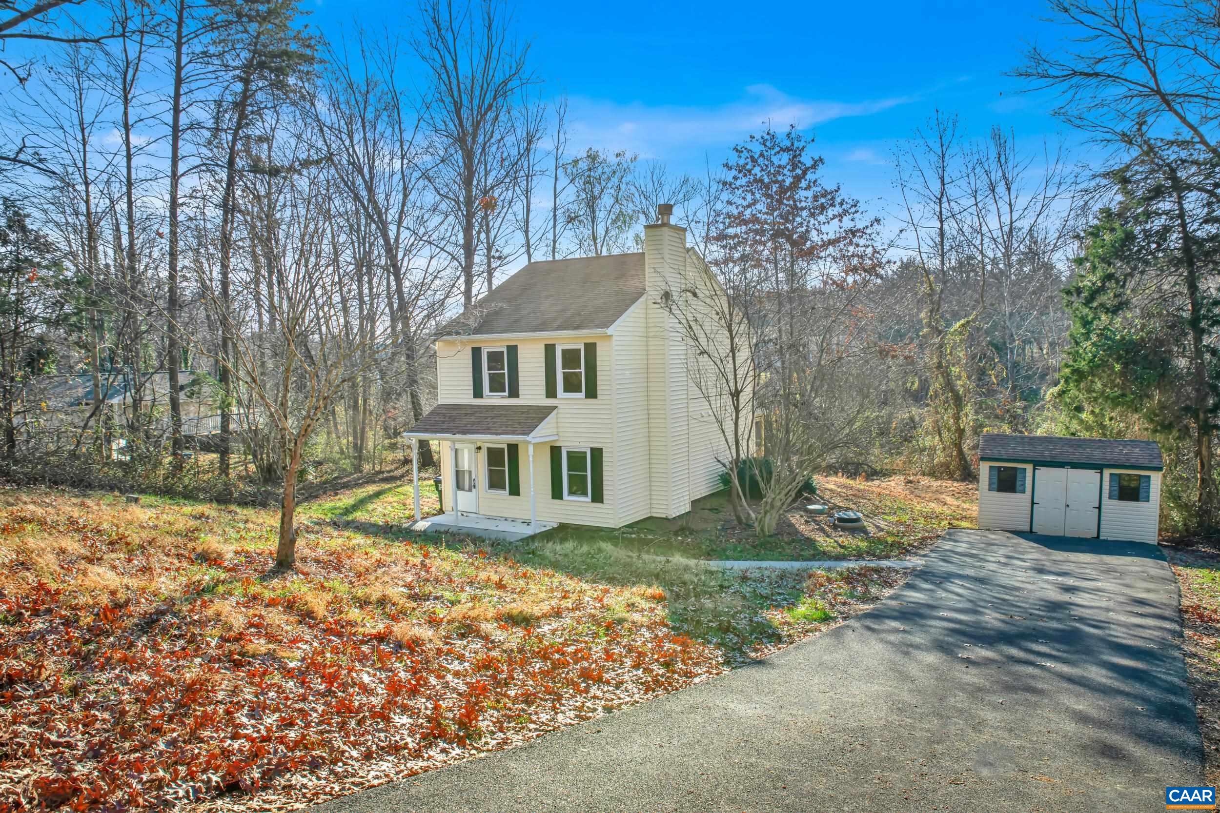 1100 West Daffodil Road Ruckersville, VA 22968 - Photo 2 of 27 a front view of a house with a yard