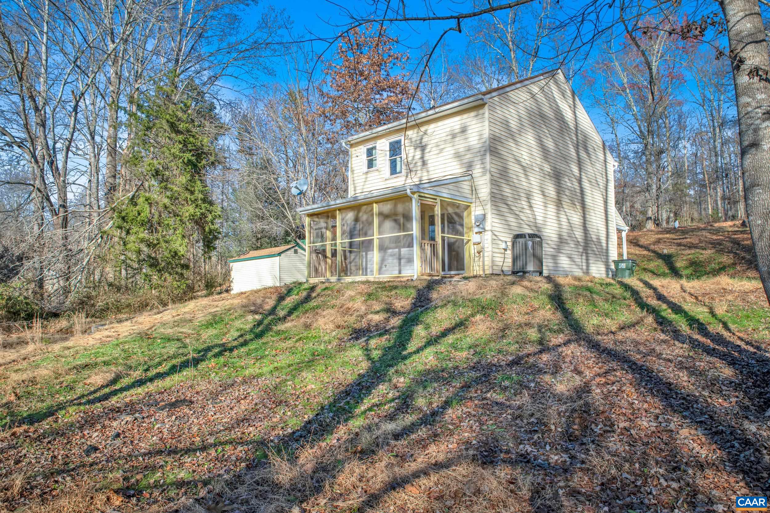 1100 West Daffodil Road Ruckersville, VA 22968 - Photo 27 of 27 a view of a house with backyard and sitting area