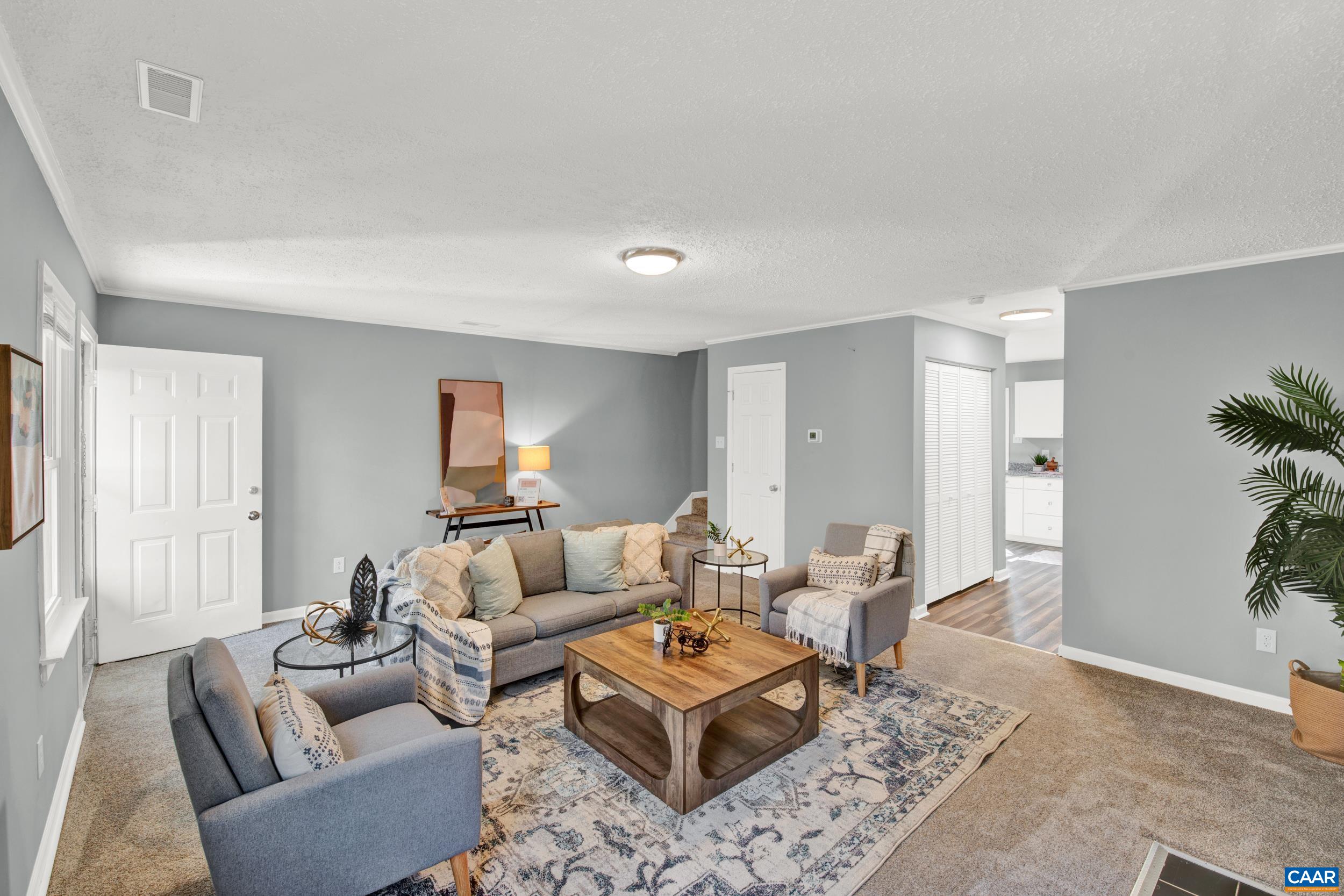 1100 West Daffodil Road Ruckersville, VA 22968 - Photo 4 of 27 a living room with furniture and wooden floor