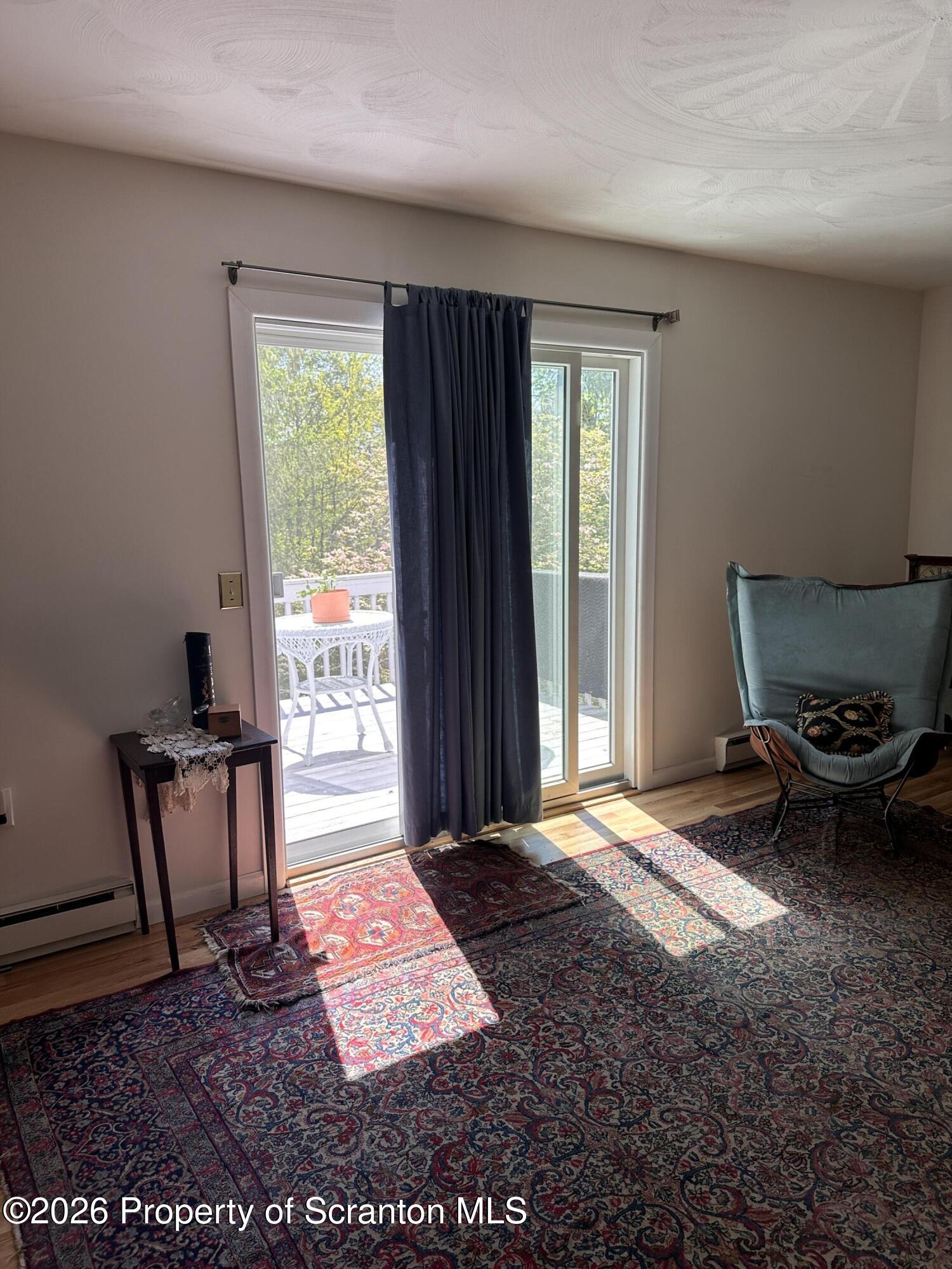 107 Keystone Hls Road, Unit 405 Factoryville, PA 18419 - Photo 7 of 27 a view of livingroom with furniture and window
