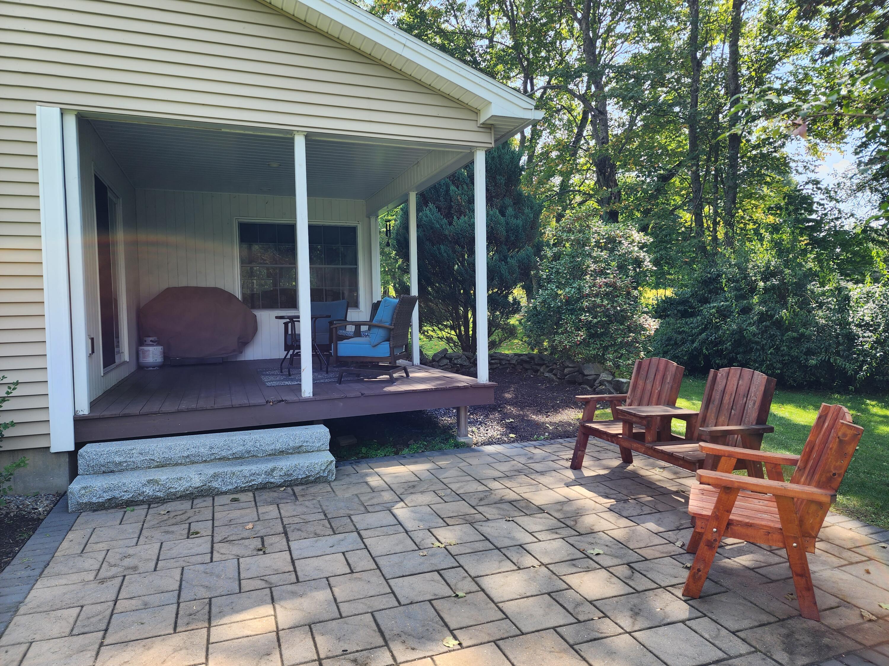 354 North Parish Road Turner, ME 04282 - Photo 14 of 79 Back porch & stone patio.