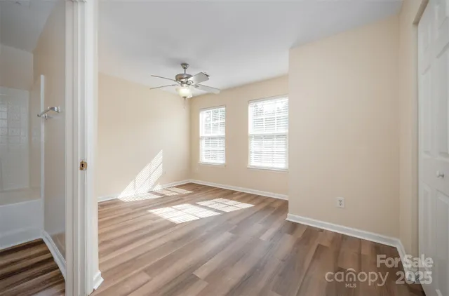 a view of an empty room and window