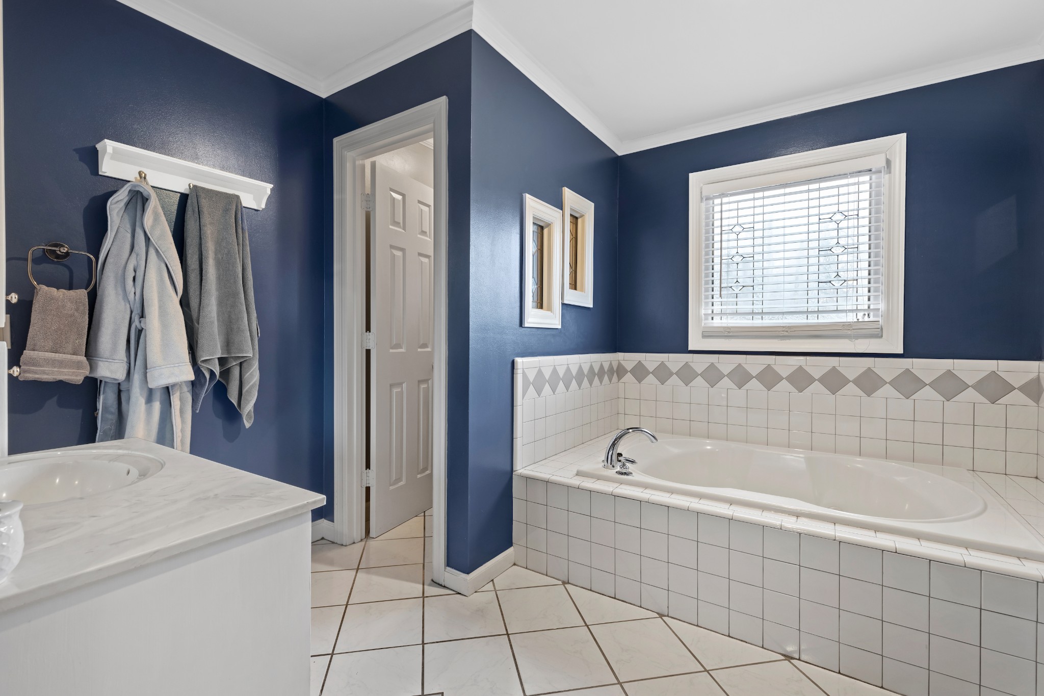 3354 Old Franklin Road Antioch, TN 37013 - Photo 32 of 46 a spacious bathroom with a tub shower and a sink