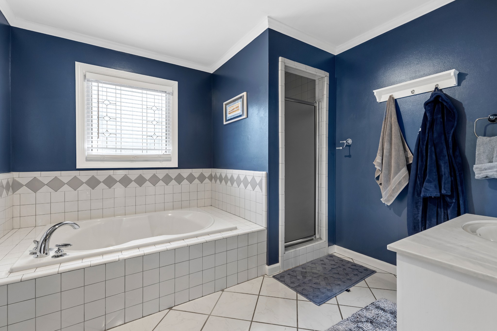 3354 Old Franklin Road Antioch, TN 37013 - Photo 33 of 46 a bathroom with a tub and a window