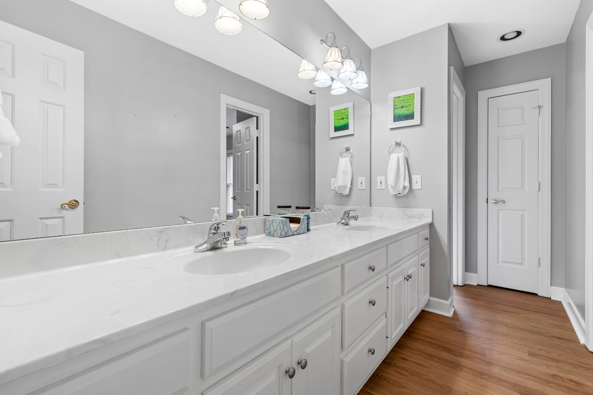 3354 Old Franklin Road Antioch, TN 37013 - Photo 39 of 46 a bathroom with double vanity sinks and a mirror