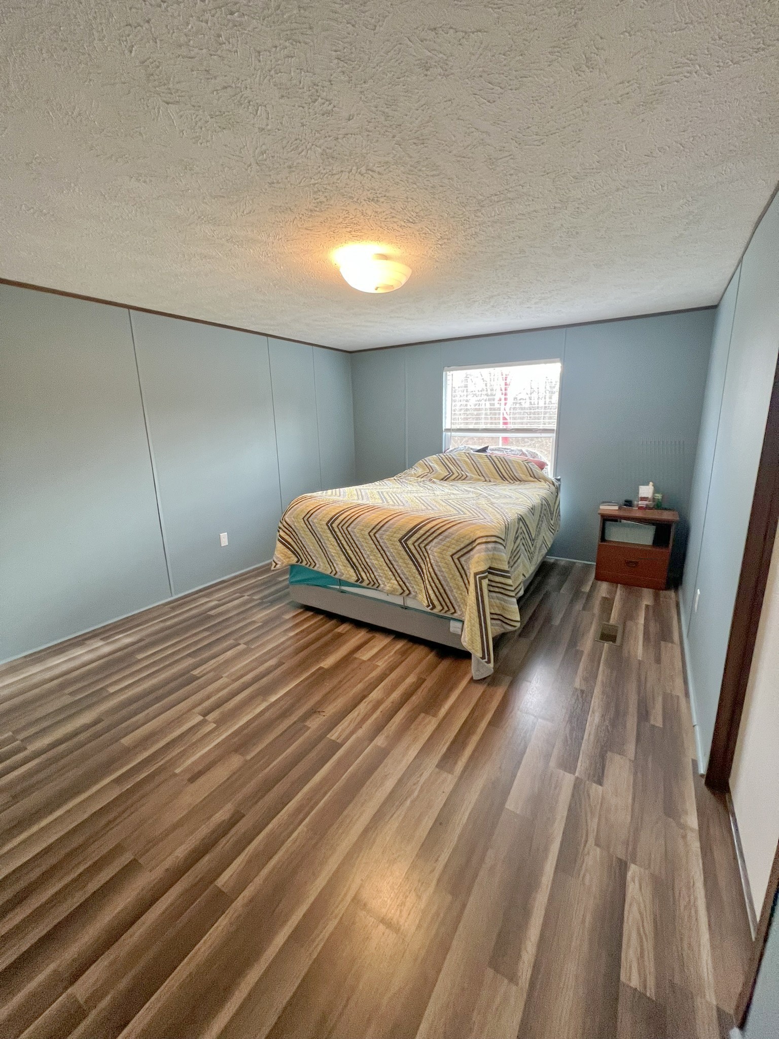 1902 B Dodson Road Columbia, TN 38401 - Photo 6 of 24 a spacious bedroom with a bed and wooden floor