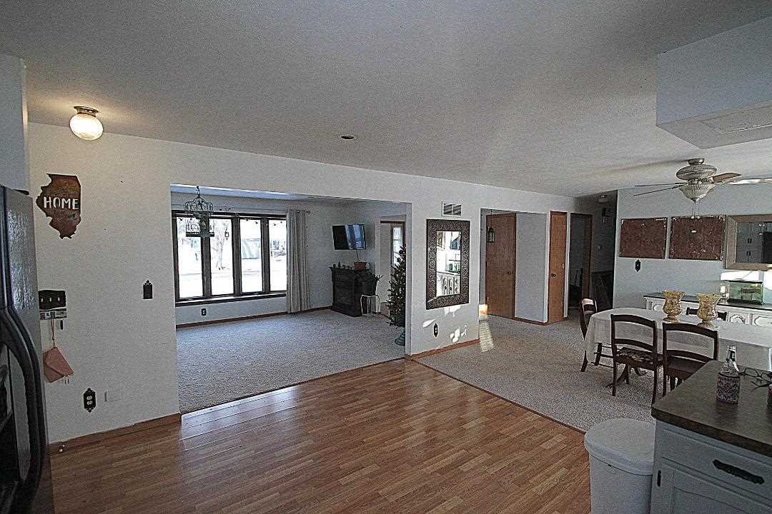 2911 Karr Road Belvidere, IL 61008 - Photo 4 of 19 a living room with furniture window and wooden floor