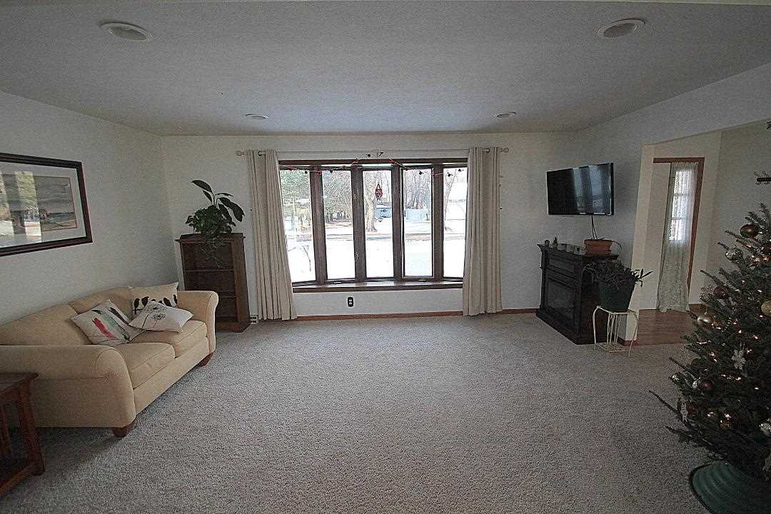 2911 Karr Road Belvidere, IL 61008 - Photo 7 of 19 a living room with furniture and a flat screen tv