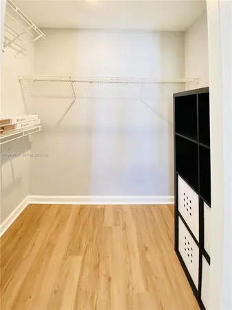 a kitchen with a stove and a microwave