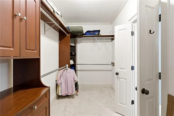 a view of a pathway of a house with wooden floor